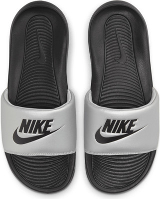 all black nike flip flops