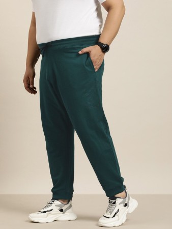 Skechers Solid Women Green Track Pants - Buy Skechers Solid Women