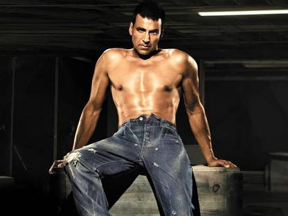 Akshay kumar showinh Body poster Paper Print