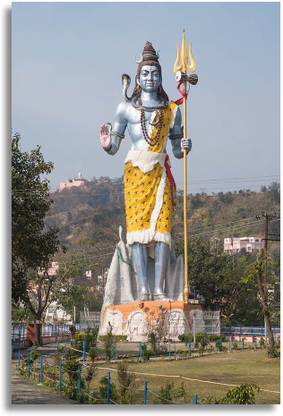 The giant statue of standing lord Shiva near Ganges in Haridwar Paper Print
