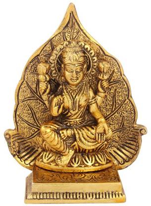 Handicrafts Paradise Lakshmi ji with leaf back drop in antique golden finish metal by Handicrafts Paradise Decorative Showpiece  -  13 cm