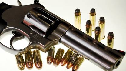 BULLET WITH GUN wall poster with waterproof lamination (12X18 inch) without frame Paper Print