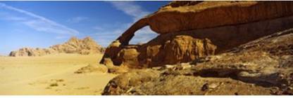 Natural arch Eye of the Eagle Arch Wadi Rum Jordan Canvas Art - Panoramic Images (18 x 6) Canvas Art