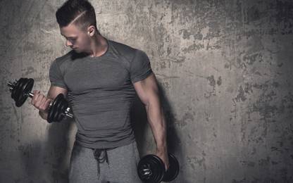 Gym poster|Boy Doing Dumbbells Poster|High Resolution -300 GSM- (18 x 12) Paper Print