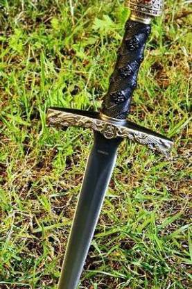Ornate Dagger in the Grass Journal