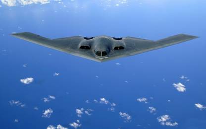A B-2 Spirit soars through the sky after a refueling mission Canvas Art - Stocktrek Images (36 x 22) Canvas Art