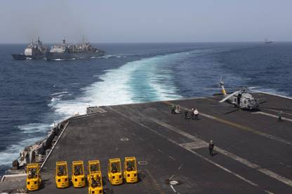 US Navy ships in the Arabian Sea during a replenishment at sea exercise Canvas Art - Gert KromhoutStocktrek Images Canvas Art
