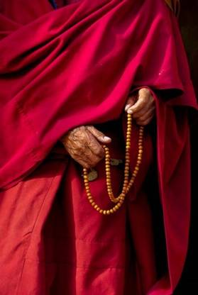 Hands of a monk in red holding prayer beads Leh Ladakh India Canvas Ar Canvas Art
