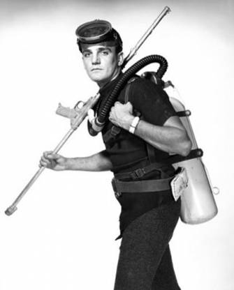 Scuba diver carrying oxygen tank and speargun Canvas Art Canvas Art