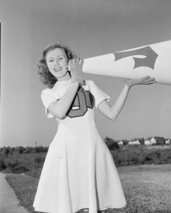 Portrait of cheerleader with megaphone Canvas Art - (18 x 24) Canvas Art