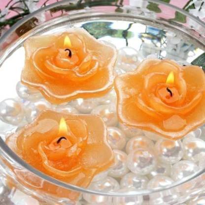 Set of three rose flower floating candles in sea paper gift box random colours