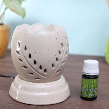 Flipkart Perfect Homes Citrus Diffuser Set Ceramic Electric Diffuser (kamal Shape) White Color wih 10 ml Fragrance oil