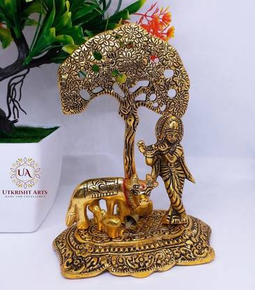 Utkrisht Arts Metal Krishna with Cow Standing Under Tree Playing Flute / Brass Showpiece / Murti / Cow Idol / Showpiece / God Idols Decorative Showpiece  -  17 cm