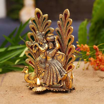 KridayKraft Radha Krishna Peacock Diya Metal Statue,Radha Krishna murti for Puja & Home Decor,Showpiece Gifts Idols,Return gift,Birthday Gift,Gift for Relatives.. Decorative Showpiece – 20 cm  (Metal, Gold) at Rs. 304
