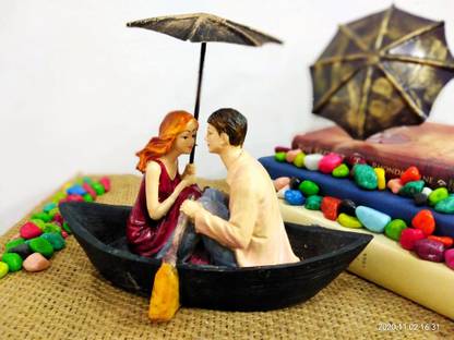 eHouse of Crafts Resin Boat Love Couple with Metal Umbrella Statue Girl Friend & Boy Friend Sitting Romantic Pose Best Decorative Showpieces Idol for Home Décor Valentine Wedding Decorative Showpiece  -  22 cm