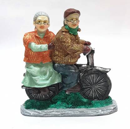 QUIRKY HOMEZ Cute Grand Parents enjoying Motorbike Riding Pose Set of two pieces (QH-0114) Decorative Showpiece  -  18.5 cm