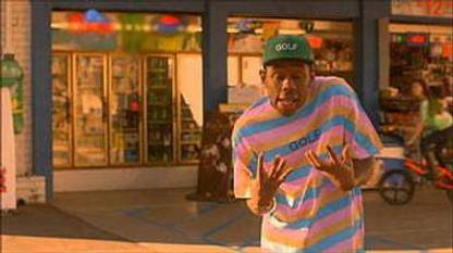 Tyler The Creator Is Standing In A Store Background With Eyes Closed Music Matte Finish Poster Paper Print
