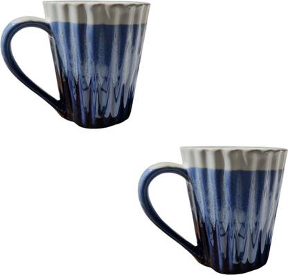 Creativeglut Set of two textured ceramic glossy dual color mugs Ceramic Coffee Mug
