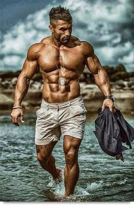 Bodybuilder enjoying the beach Paper Print