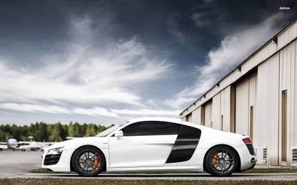 Athah White Audi R8 side view in front of a warehouse Poster Paper Print