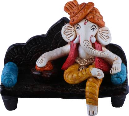 The Nodding Head Aaram Ganesh Sitting In Sofa (Yellow) Decorative Showpiece  -  13 cm