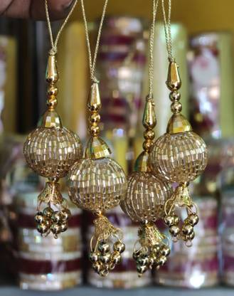 Atrika Gold Latkan with Lace for Dupatta, Lehenga, Blouse, Bangles and Saree Brooch