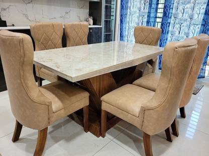 nirmala V-Shaped Dining Table with Marble & Modern Curved Chairs Fabric 6 Seater Dining Table