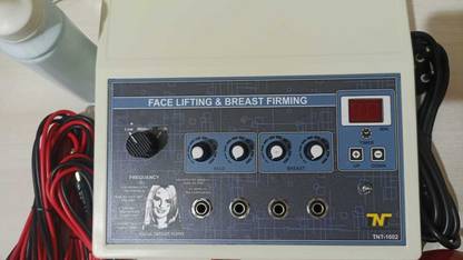TNT Face Lifting and Breast Firming Machine With 2 Year of Warranty laser Electrotherapy Device