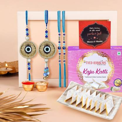 TIED RIBBONS Rakhi for Bhaiya and Bhabhi - 4 Rakhi Set with Kaju Katli, Card, Roli, Chawal Assorted Gift Box