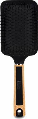 LARA KOSSLER Long Hair’s Best Friend: The Paddle Brush