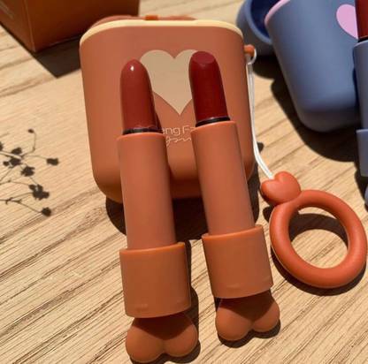 बजाज ब्यूटी शॉप Cute Earbuds Shaped Case Set of 2 Matte Lipsticks. Shades Available (Brown Case)