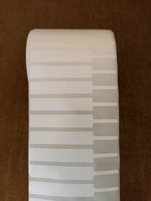 BARCODING TECH Polyester Jewellery tag, Partial / Half Gum, 70mm x 10mm, printable 50mm Partial / half gum On the tail. Paper Label