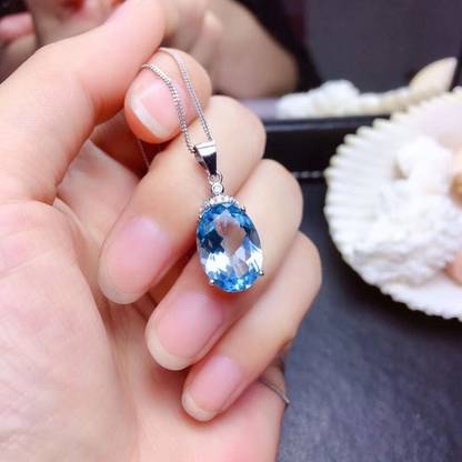 Designs & You Silver Plated American Diamond Crushed Ice Cut Blue Oval Shape Pendant Silver Cubic Zirconia Brass Pendant