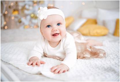 Cute Little Baby Girl with Bow Flower on her Head / Cute Baby Posters | Baby Girl/Boy Poster | Smiling Baby Poster | Poster for Pregnant Women | New Born Cute Small Posters in Room decor with Small Size | Gloss Laminated Paper Size -24 x 36 Inch | Single Photo Paper Print (Rolled with Safety Tube). Paper Print Photographic Paper Paper Print