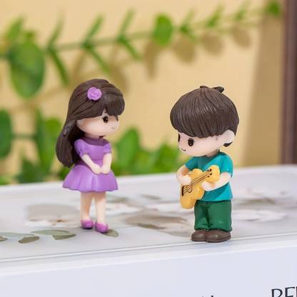 Satyam Kraft 2 Set Small Couple Miniature | Boy Playing Guitar, Girl in Purple Dress for Home Decorative Showpiece  -  5 cm