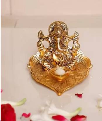 Chandra Art Collection Lord Ganesh Sitting on Leaf With Diya Decorative Showpiece  -  8 cm