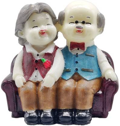 G LOOKS Laughing Old Couple Siting on Couch Statue/ Happy Couple statue for Home Decor Decorative Showpiece  -  12 cm