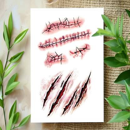 surmul Stitches and Scratch Scar Tattoos