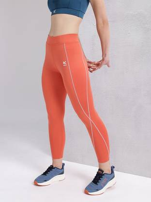 HRX by Hrithik Roshan Solid Women Orange Tights