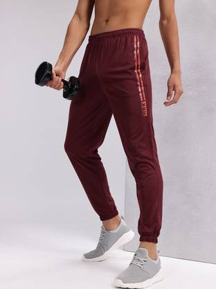 HRX by Hrithik Roshan Solid Men Maroon Track Pants
