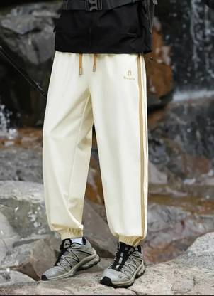 UZARSTYLE Solid Men Beige Track Pants