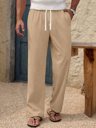 Rajovati Loose Fit Men Cream Trousers