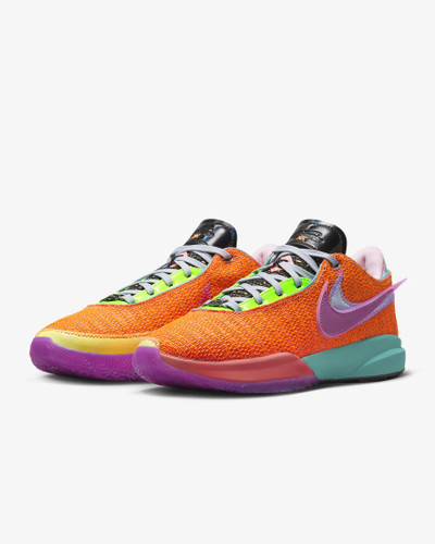 Orange and 2025 black nikes