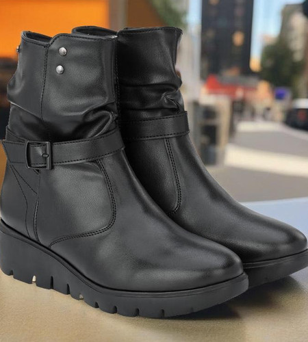 Black high wedge boots top