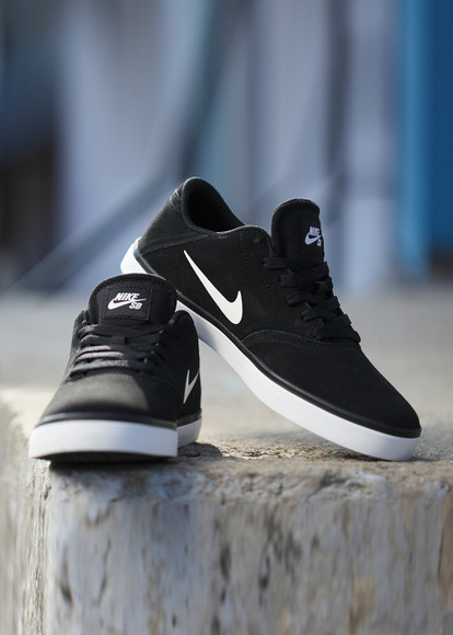 white nike shoes black check