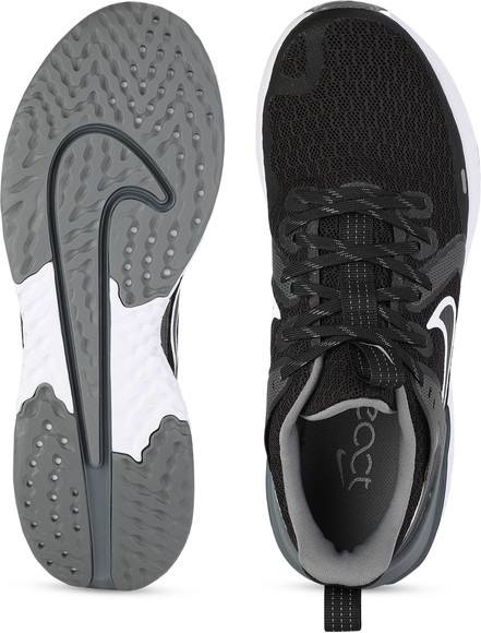 nike running legend react trainers in black and white