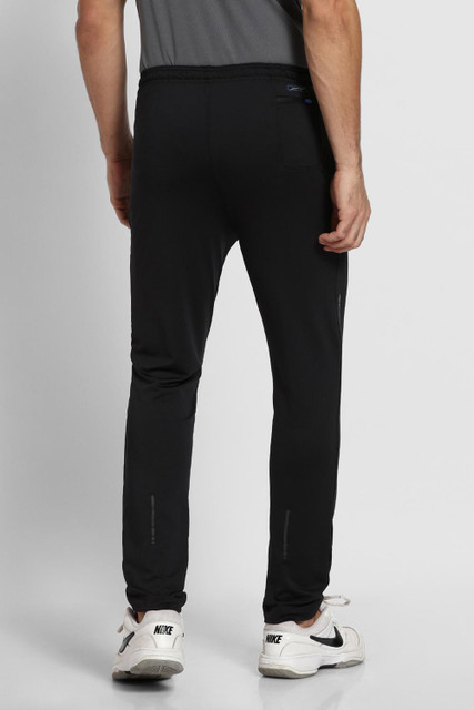 VAN HEUSEN Men Black Solid Swift Dry 4-Way Stretch Track Pants Solid Men  Black Track Pants