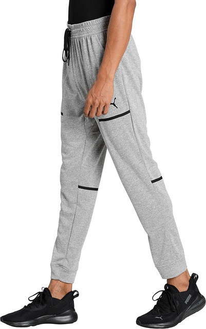 PUMA TRAIN TECH KNIT JOGGER Solid Men Grey Track Pants Buy PUMA