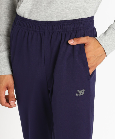 New Balance Solid Men Blue Track Pants