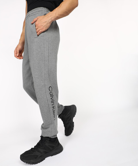 Calvin Klein Jeans Solid Men Grey Track Pants Buy Calvin Klein